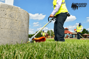 commercial lawn care crew grass edging