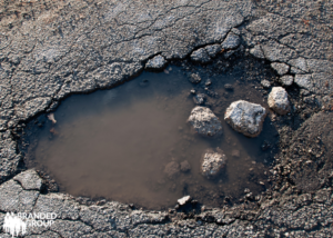 parking lot pothole needing repair